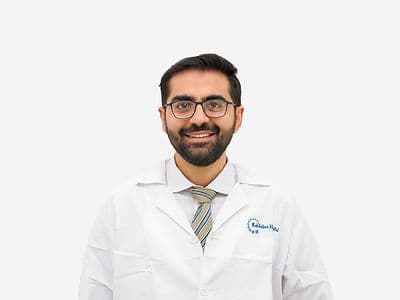 Dr Manish Hinduja