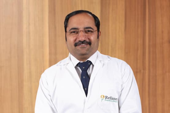 Dr. Dr. Mangesh Patil