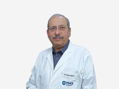Dr Tarun Kapur