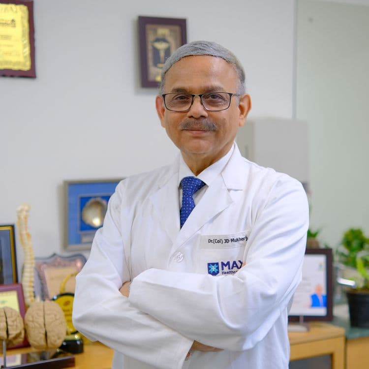 Dr. Dr. (Col) Joy Dev Mukherji
